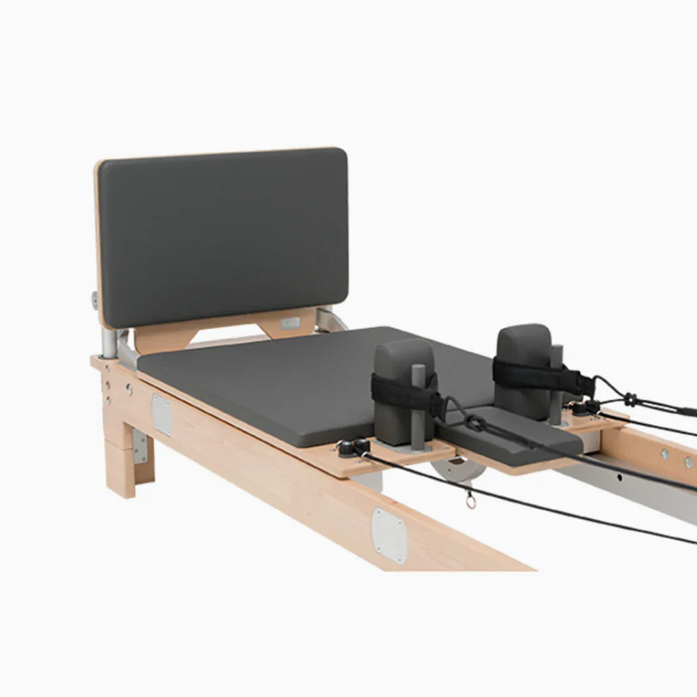 Commercial Pilates reformer jump board attachment