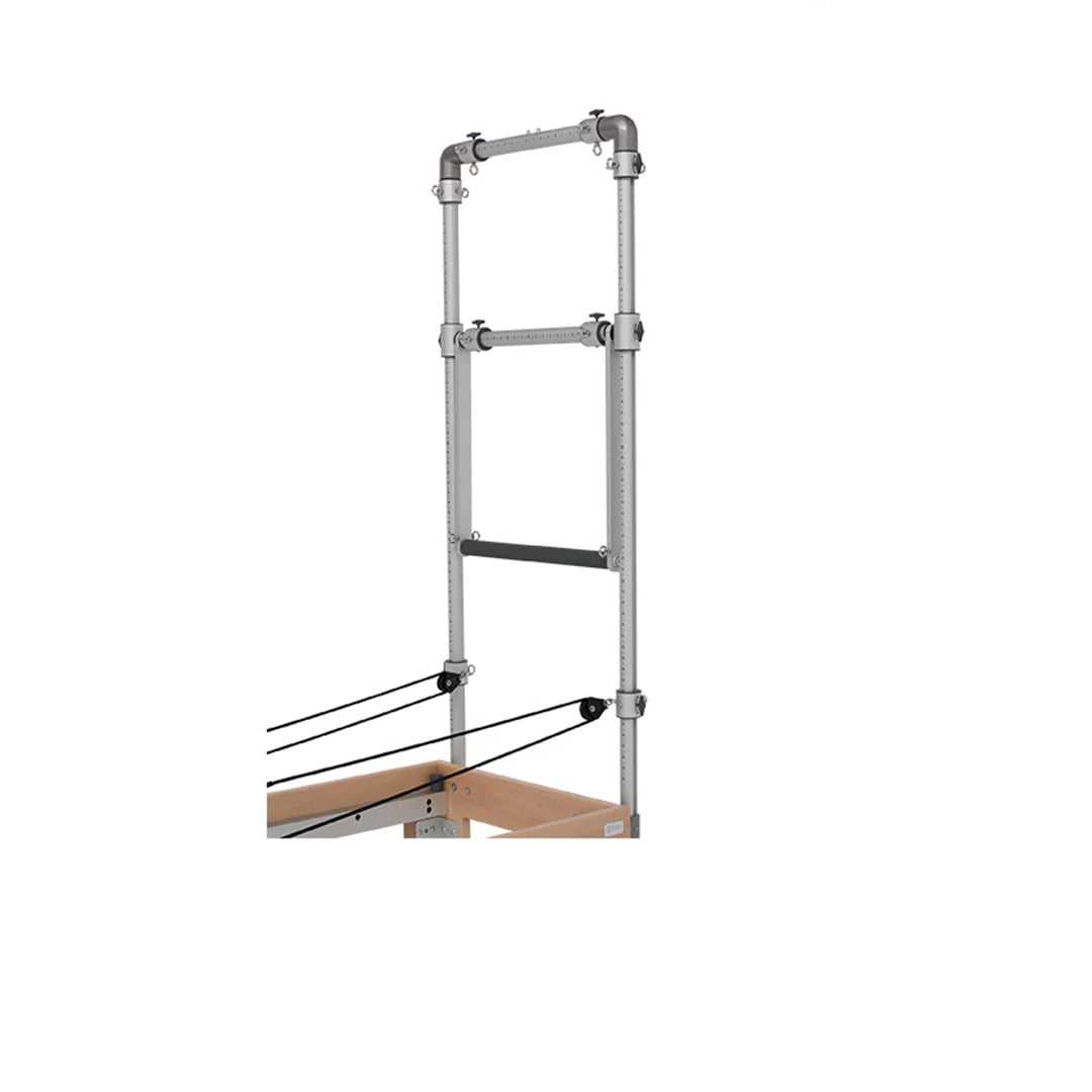 Adjustable footbar mechanism on the BASI Systems Reformer, showcasing multiple gear positions for personalized foot placement and workout angles.