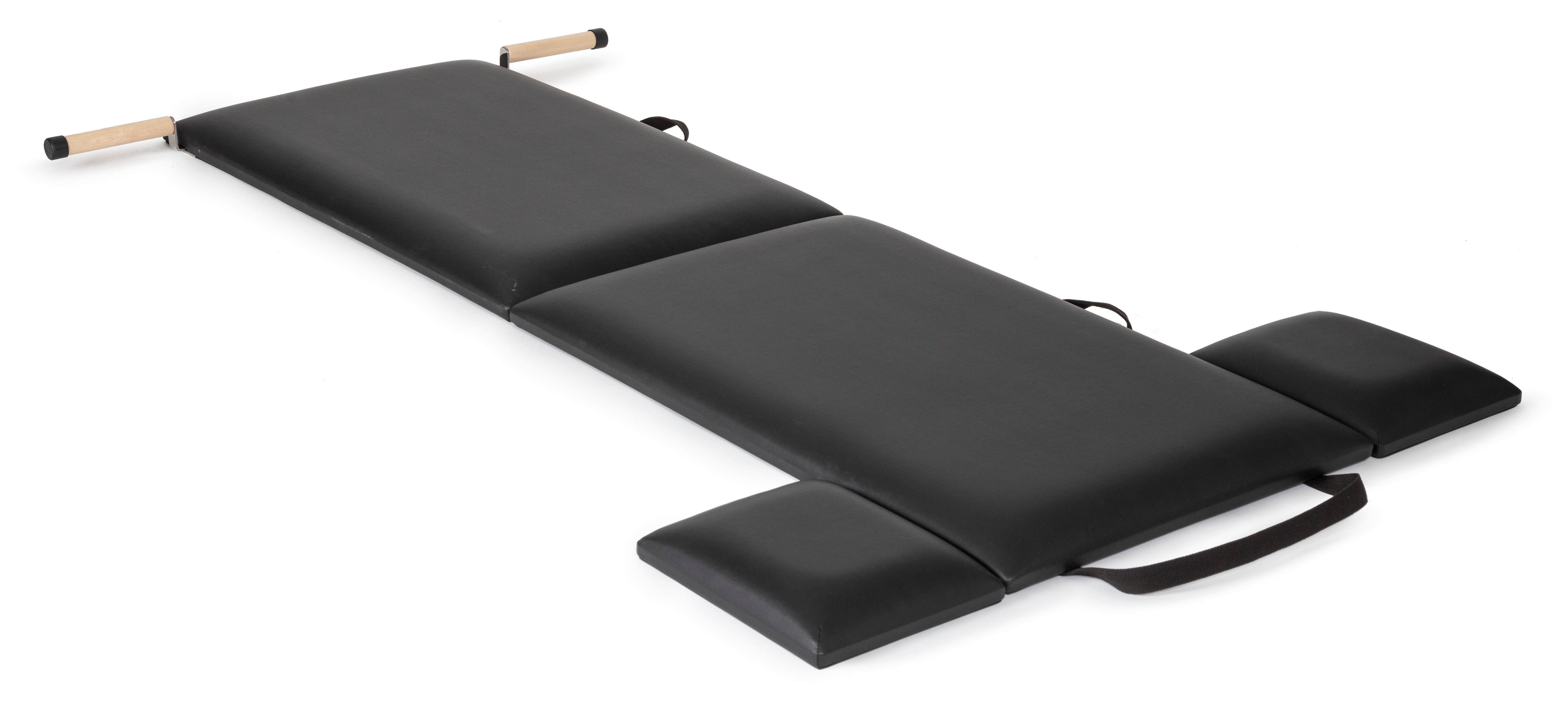 A black leather case with two knives and scissors inside, showcasing a compact and organized toolset.