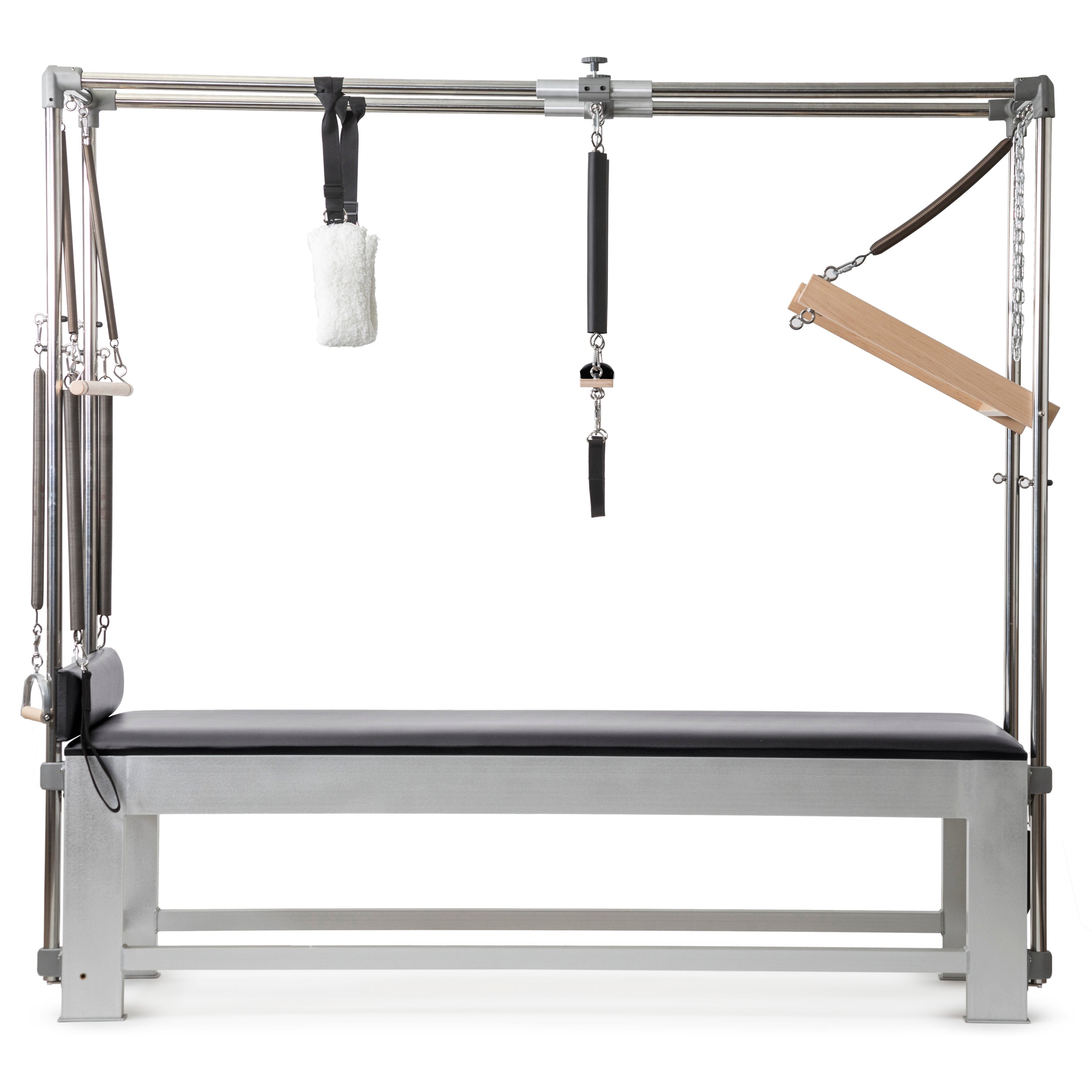A professional Pilates Cadillac reformer machine with padded table, adjustable metal frame, resistance springs, hand grips, straps, and wooden bars for therapeutic and fitness exercises.