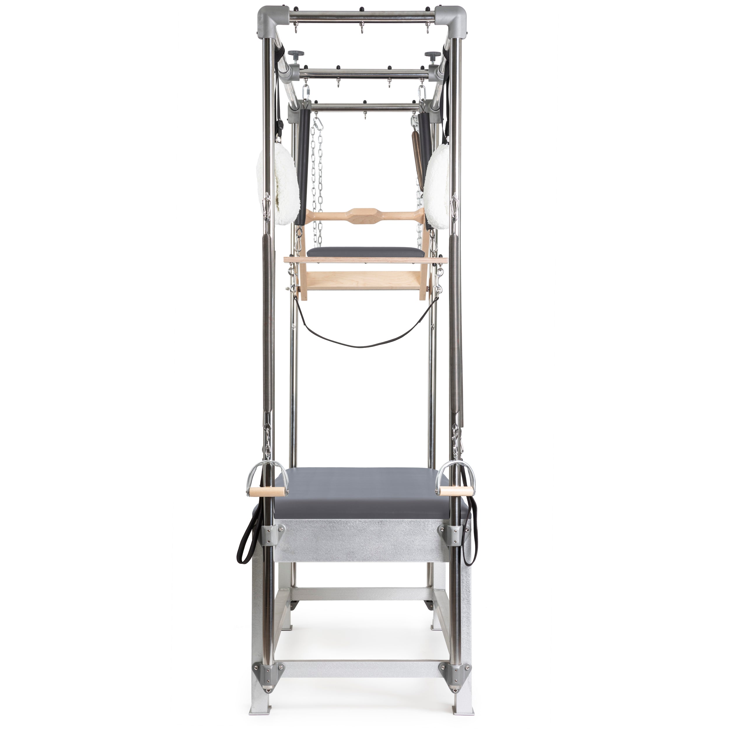 A professional Pilates Cadillac reformer machine with padded table, adjustable metal frame, resistance springs, hand grips, straps, and wooden bars for therapeutic and fitness exercises.