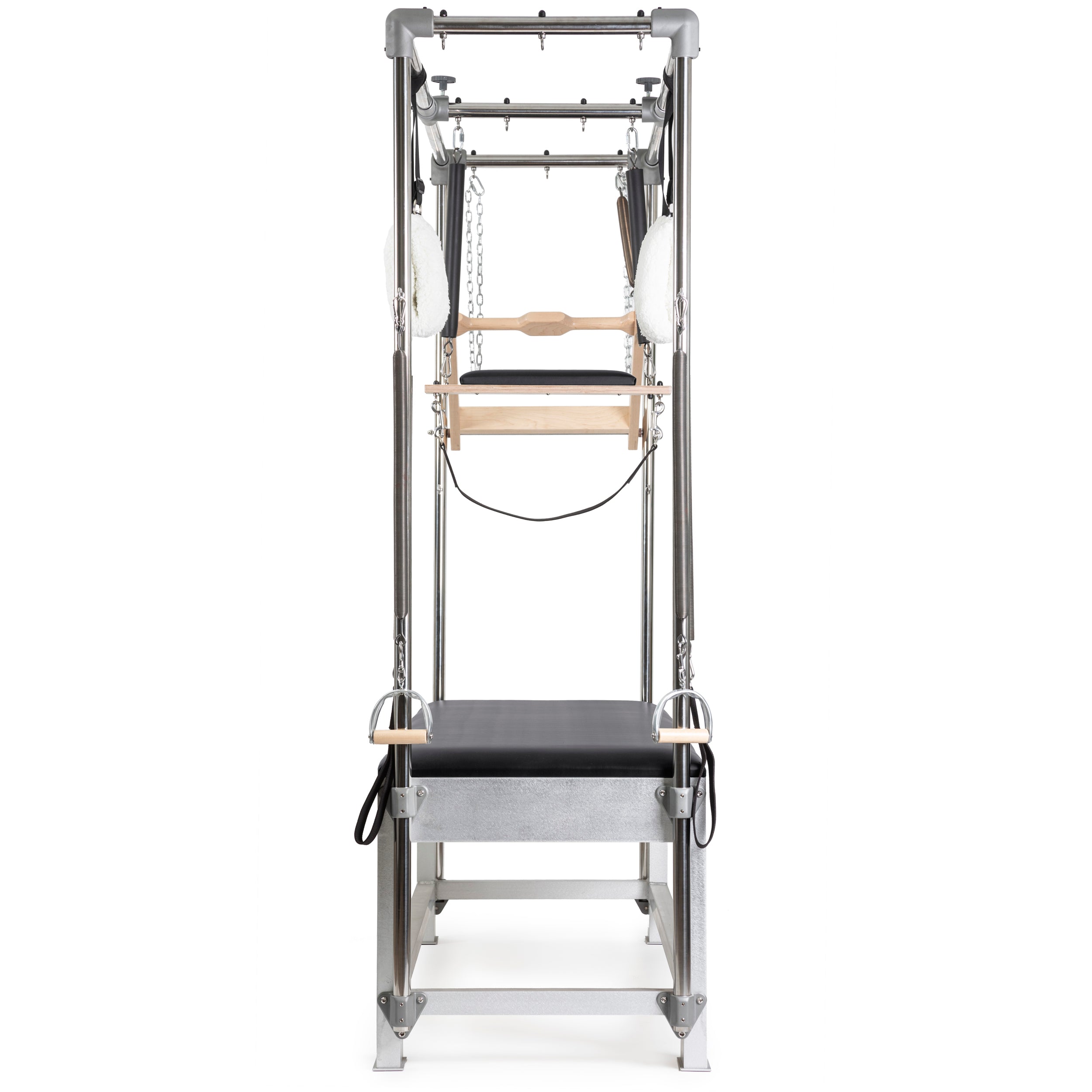 A professional Pilates Cadillac reformer machine with padded table, adjustable metal frame, resistance springs, hand grips, straps, and wooden bars for therapeutic and fitness exercises.