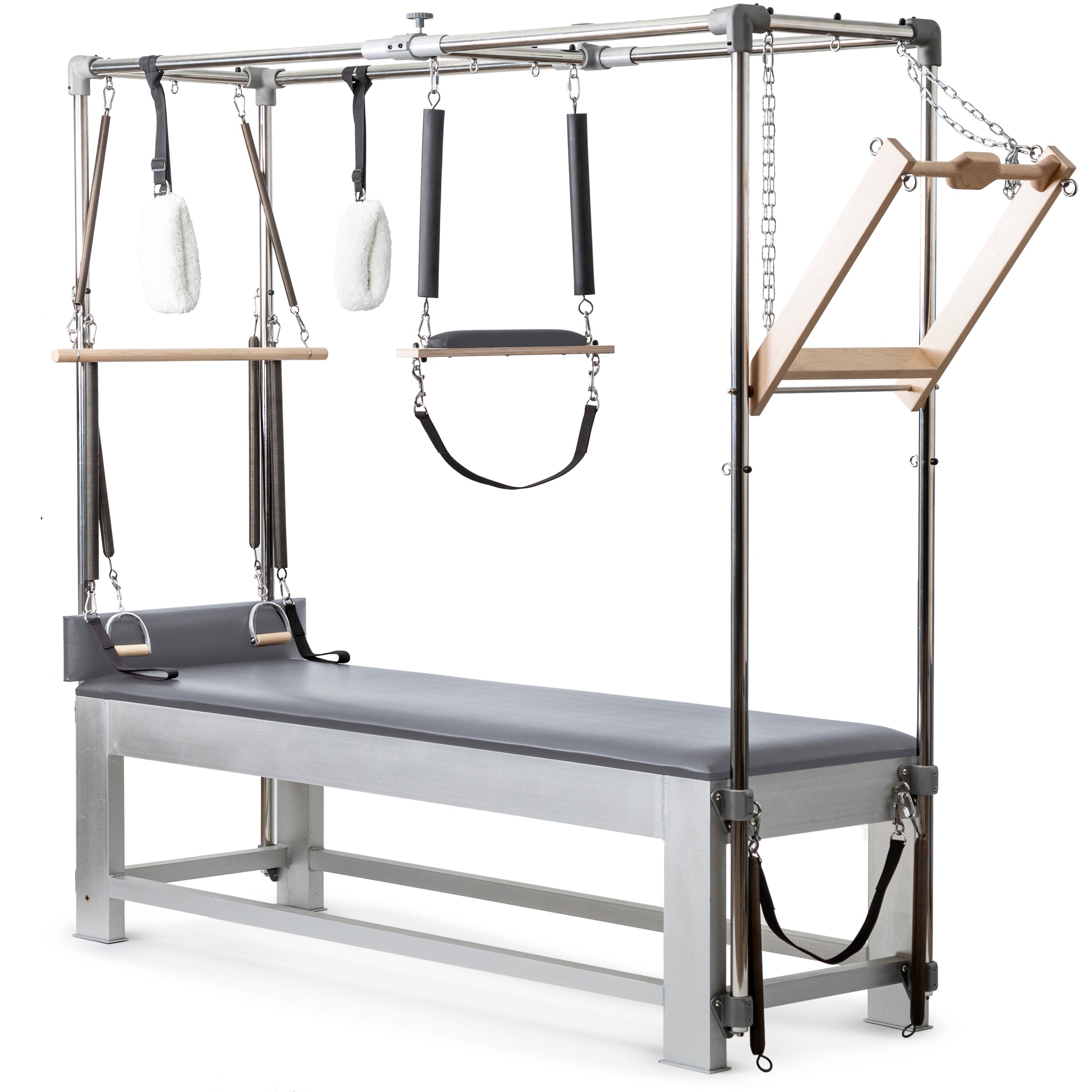 A professional Pilates Cadillac reformer machine with padded table, adjustable metal frame, resistance springs, hand grips, straps, and wooden bars for therapeutic and fitness exercises.