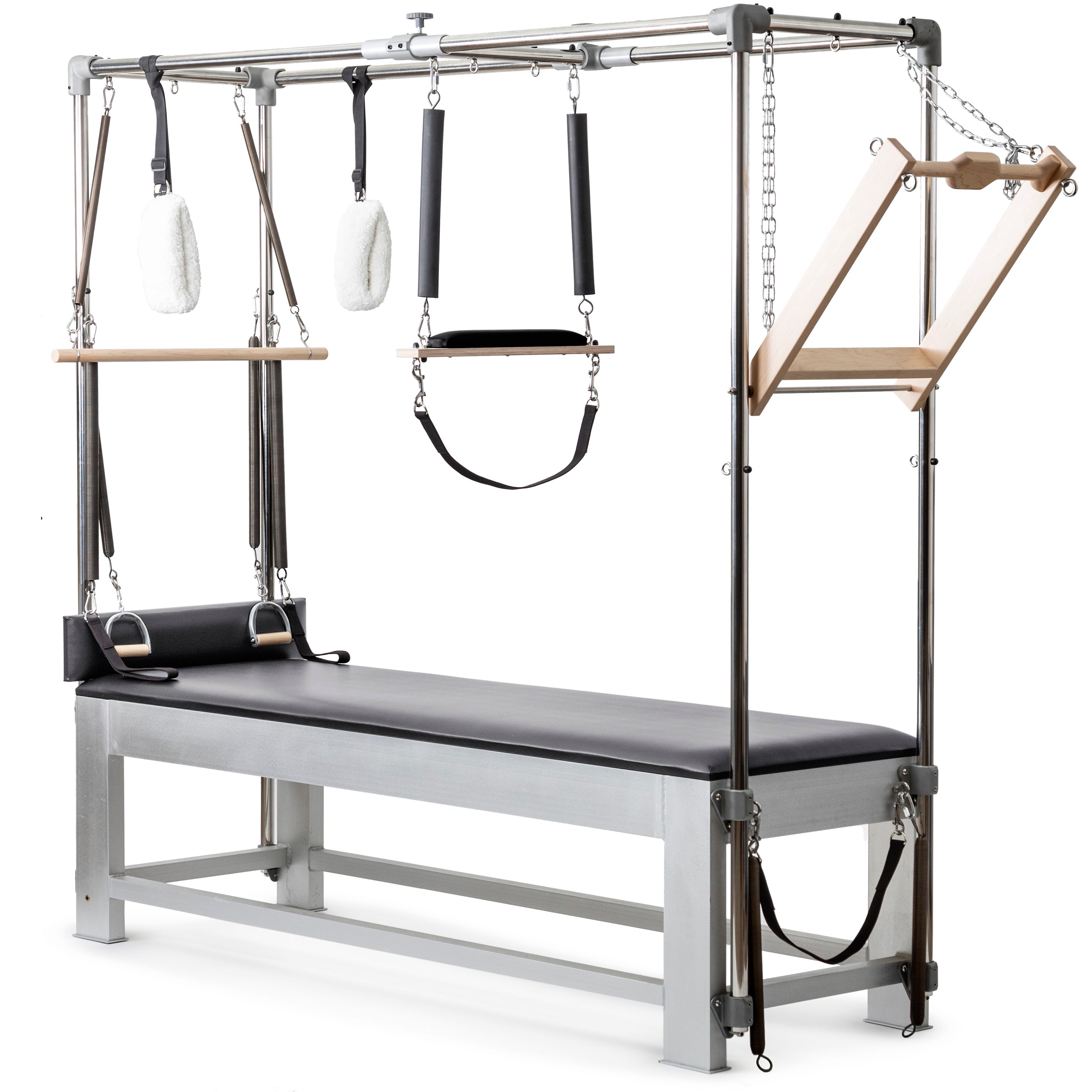 A professional Pilates Cadillac reformer machine with padded table, adjustable metal frame, resistance springs, hand grips, straps, and wooden bars for therapeutic and fitness exercises.