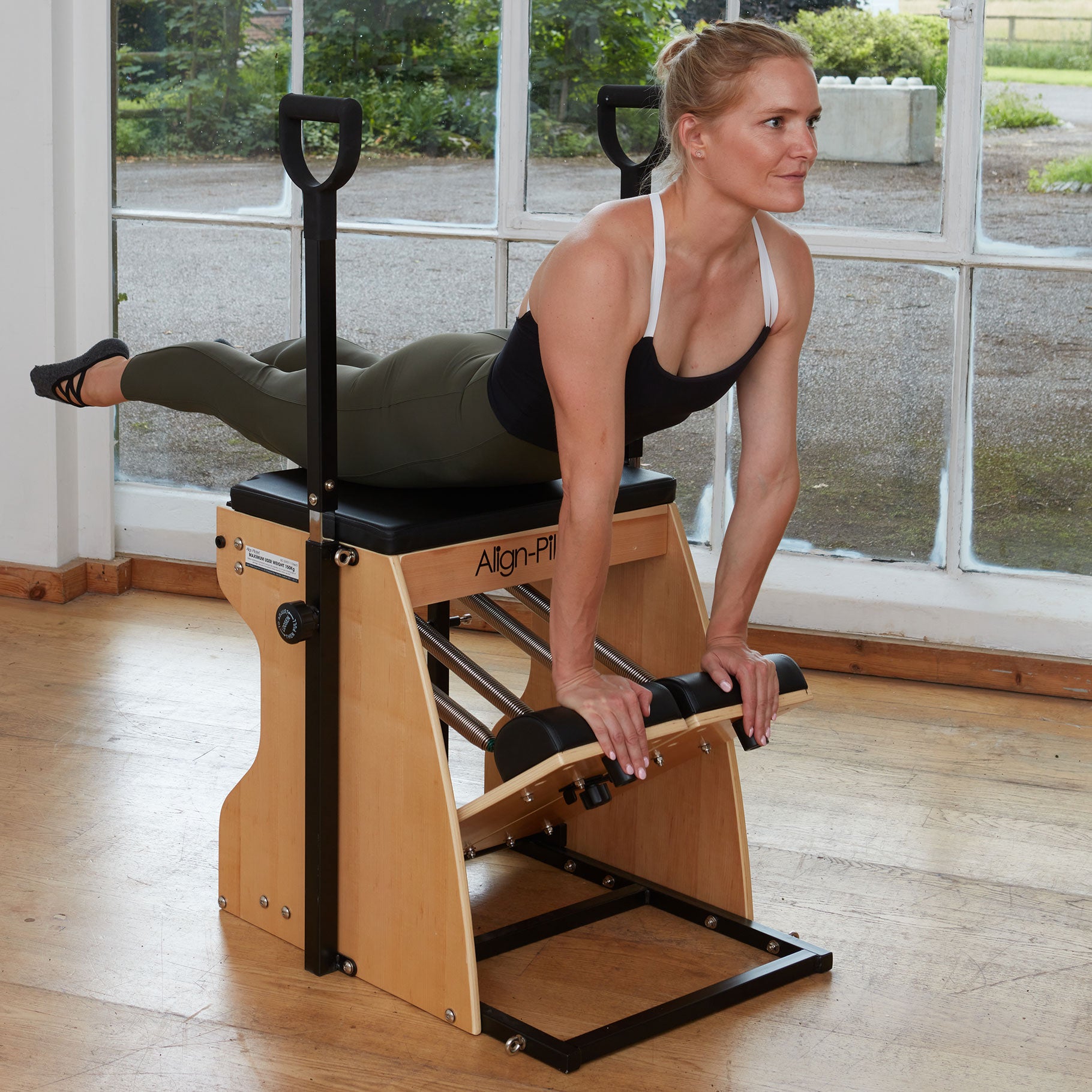 adjustable-features-of-the-align-pilates-combo-chair-III,-ensuring-comfort-and-flexibility-during-each-workout-session.