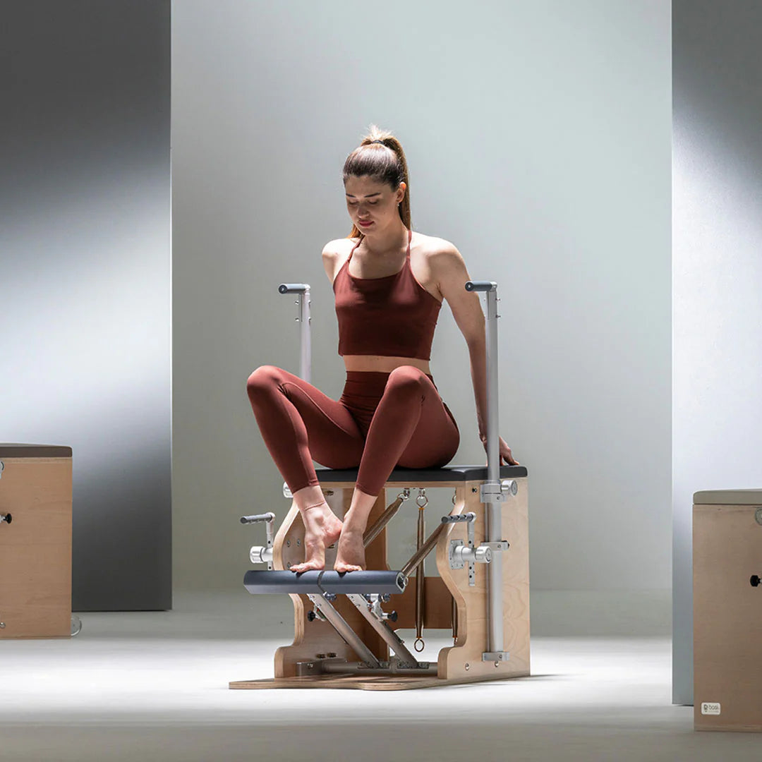 BASI Systems Wunda Chair with split pedal and adjustable handles for advanced Pilates training