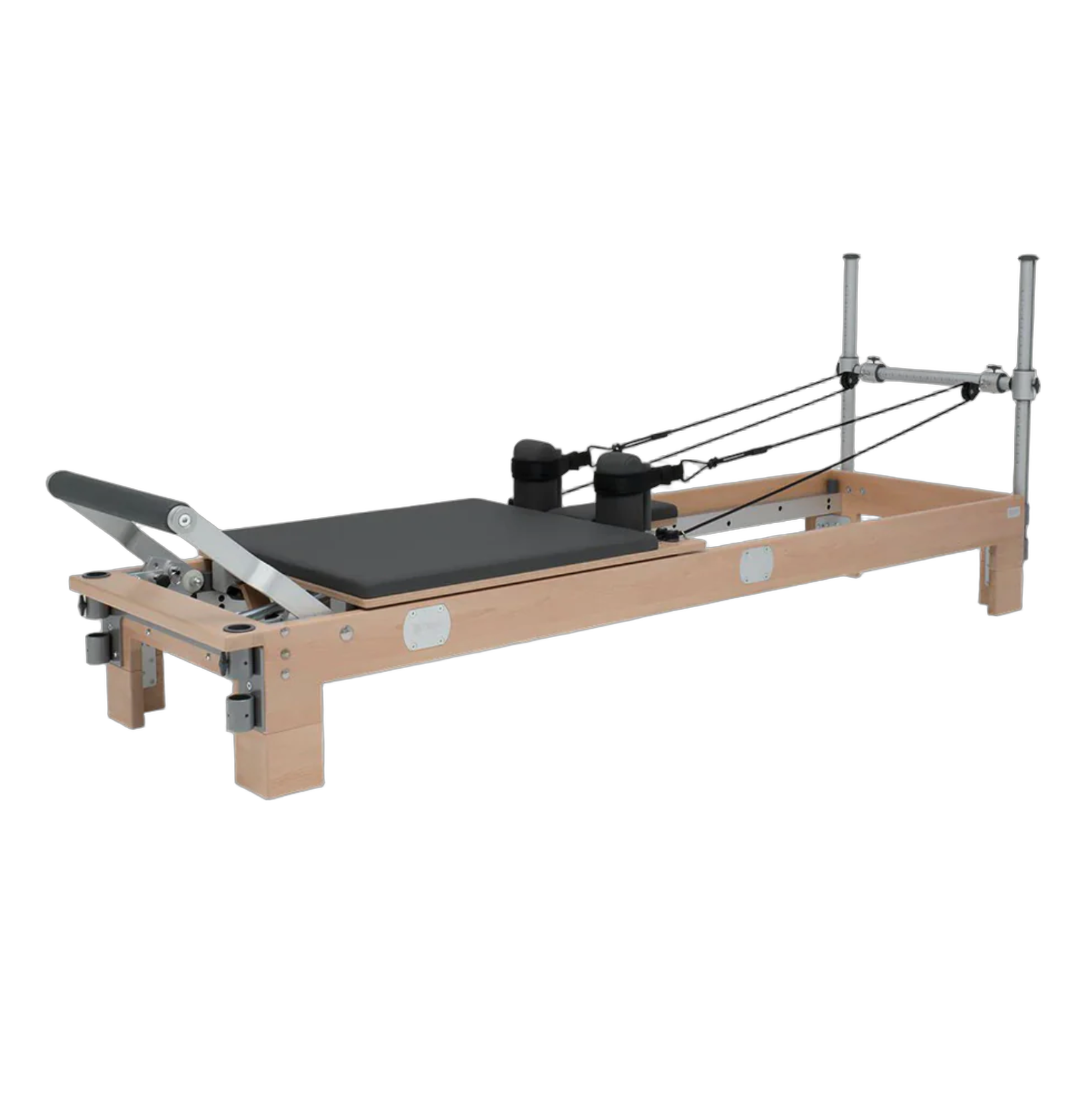Premium wooden Pilates Reformer machine featuring a sliding carriage, padded footbar, adjustable spring