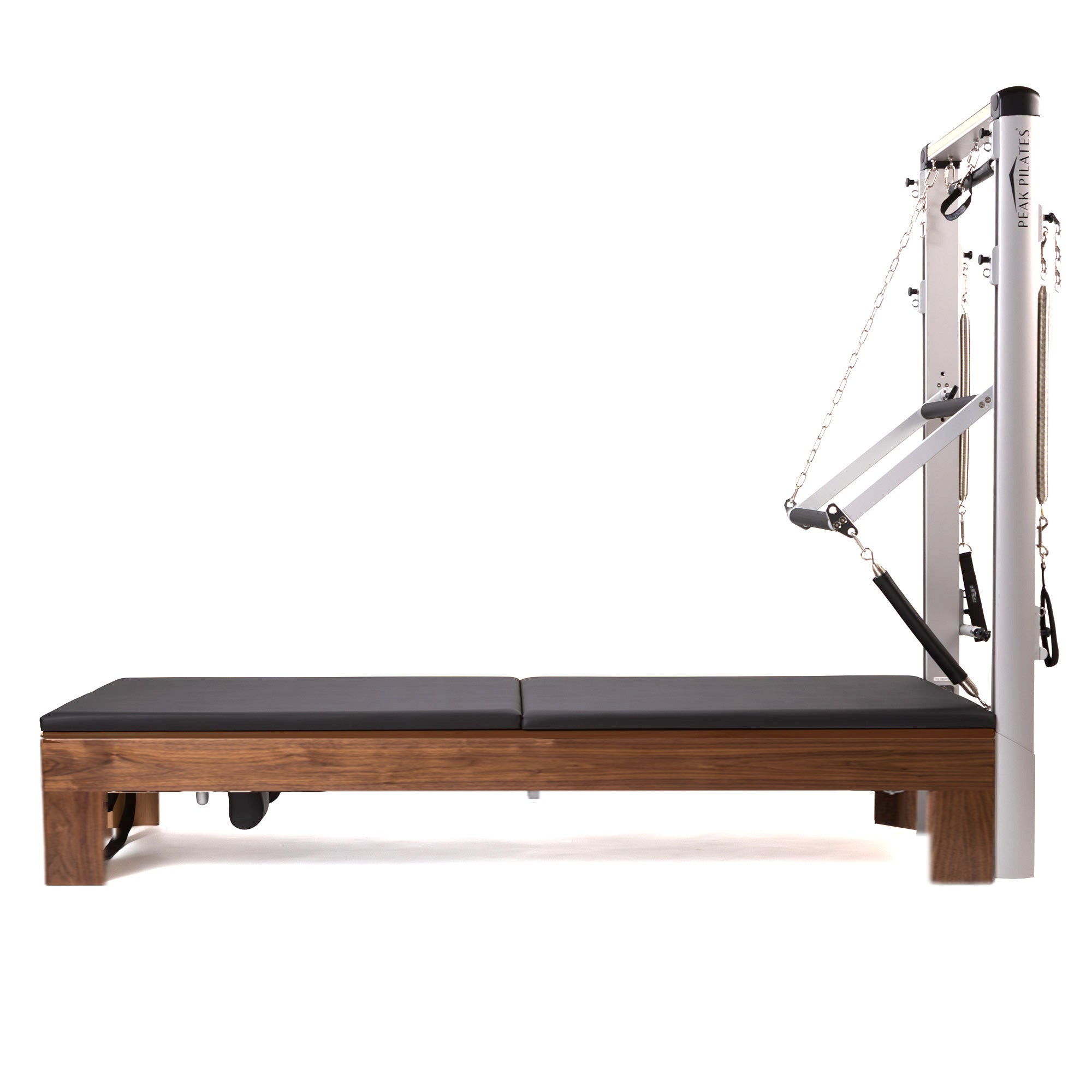 Artistry Reformer with FWS tower, walnut finish, side view