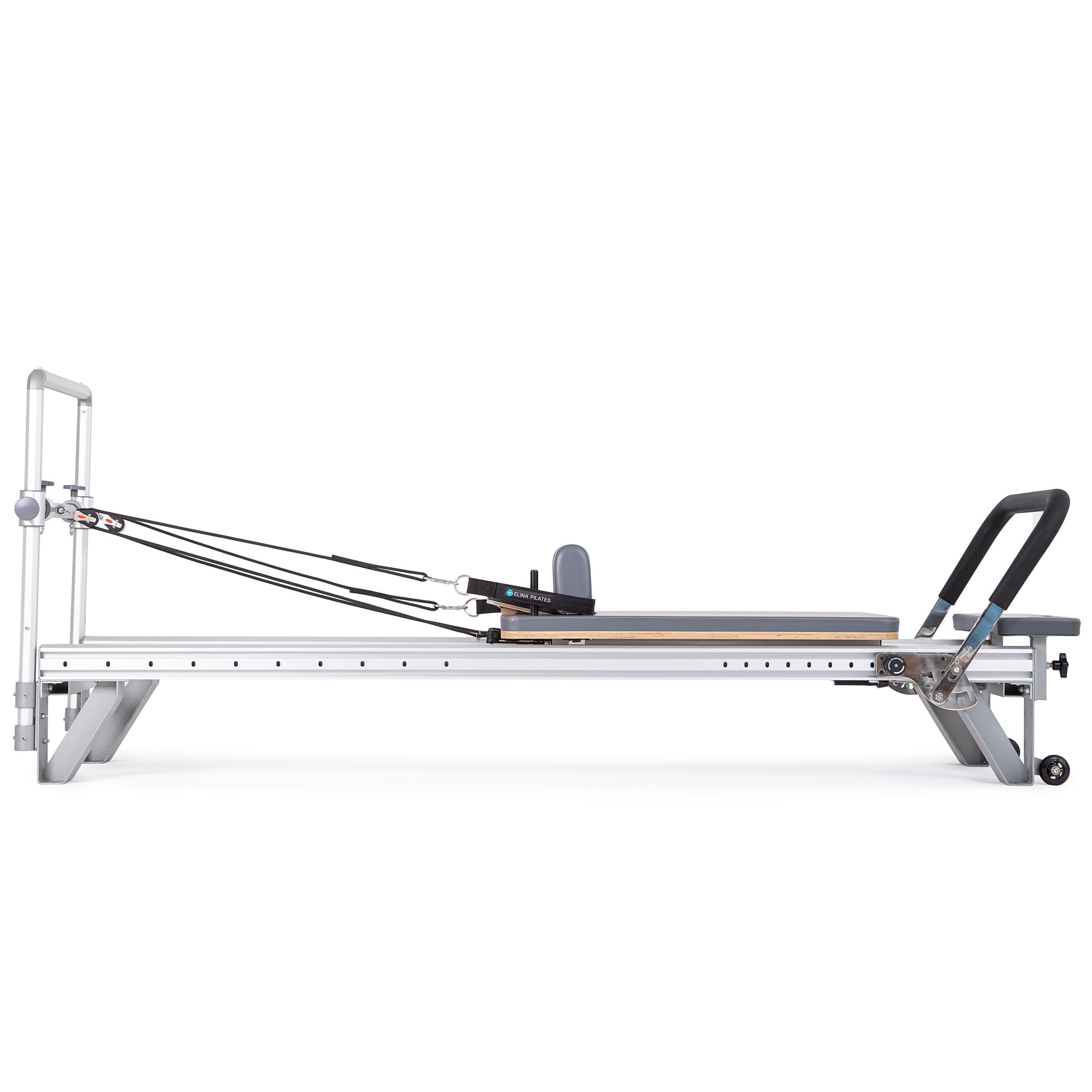 Pilates reformer with a black seat and white frame, featuring adjustable components for versatile training and comfort.