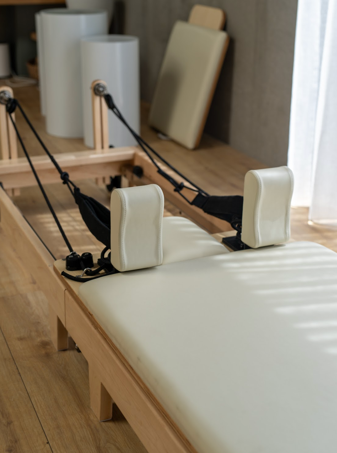 Spacious-studio-showcasing-the-Core-Collab-Eco-Foldable-Pilates-Reformer-for-a-professional-workout-experience.